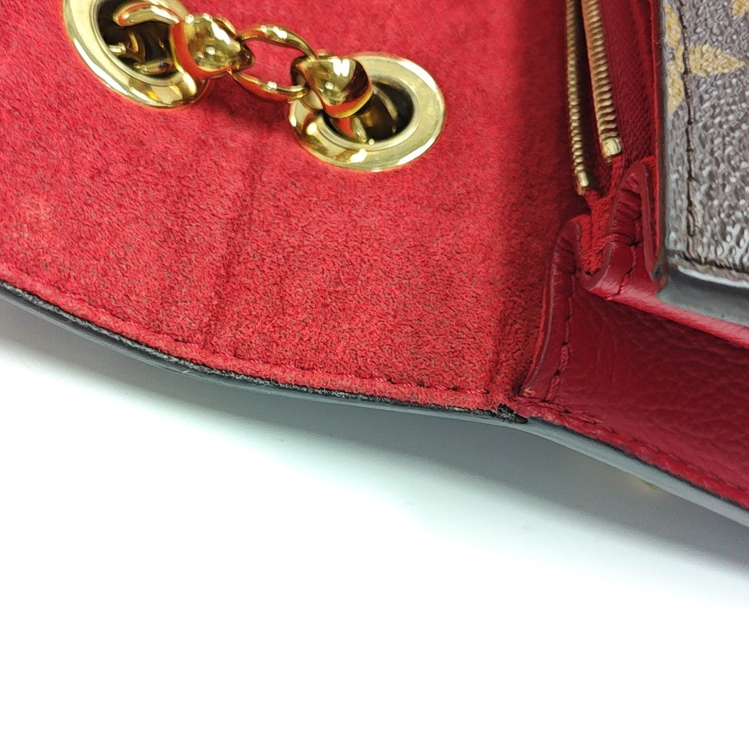 VICTOIRE Monogram Coated Canvas Brown