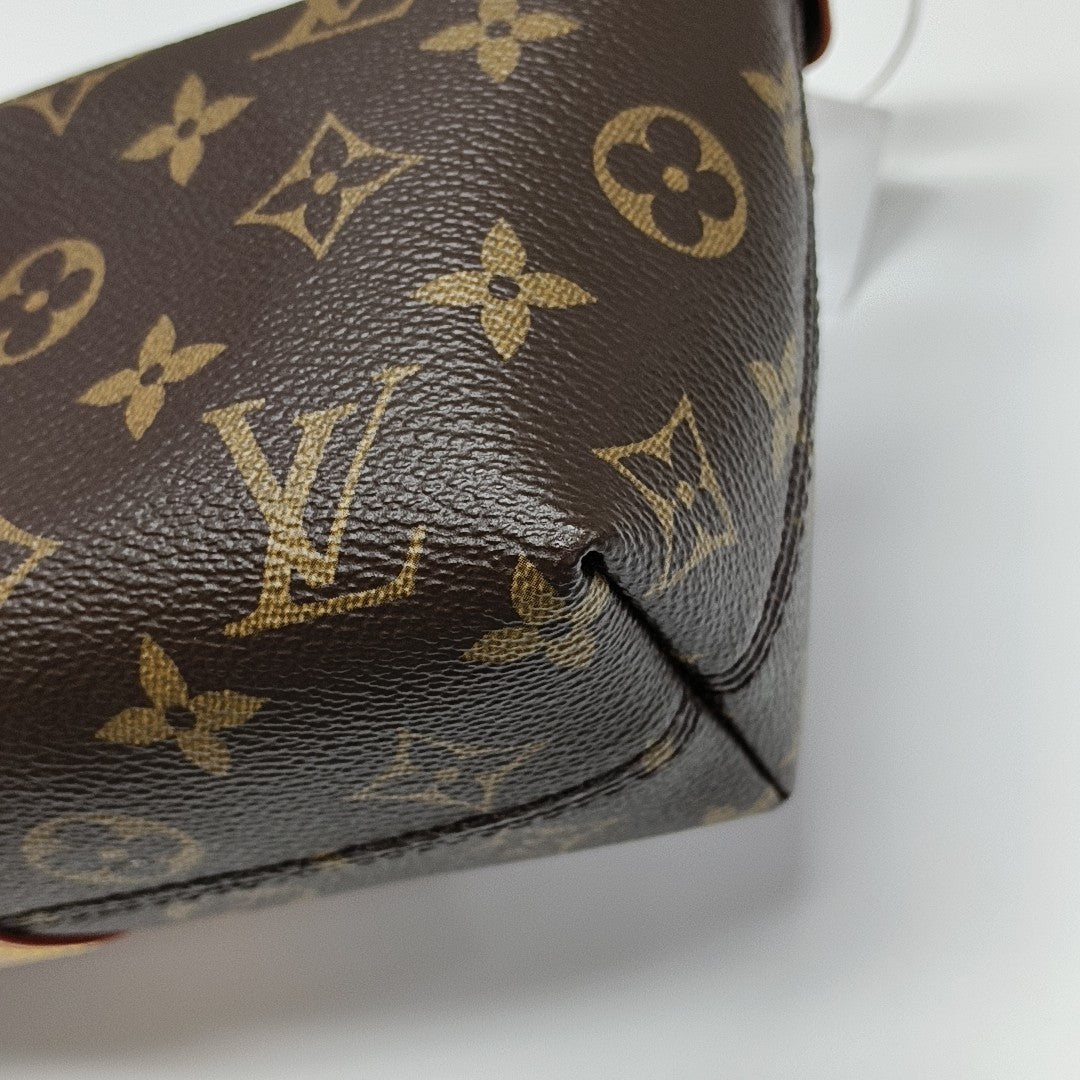 Pochette Mia Monogram Coated Canvas Brown