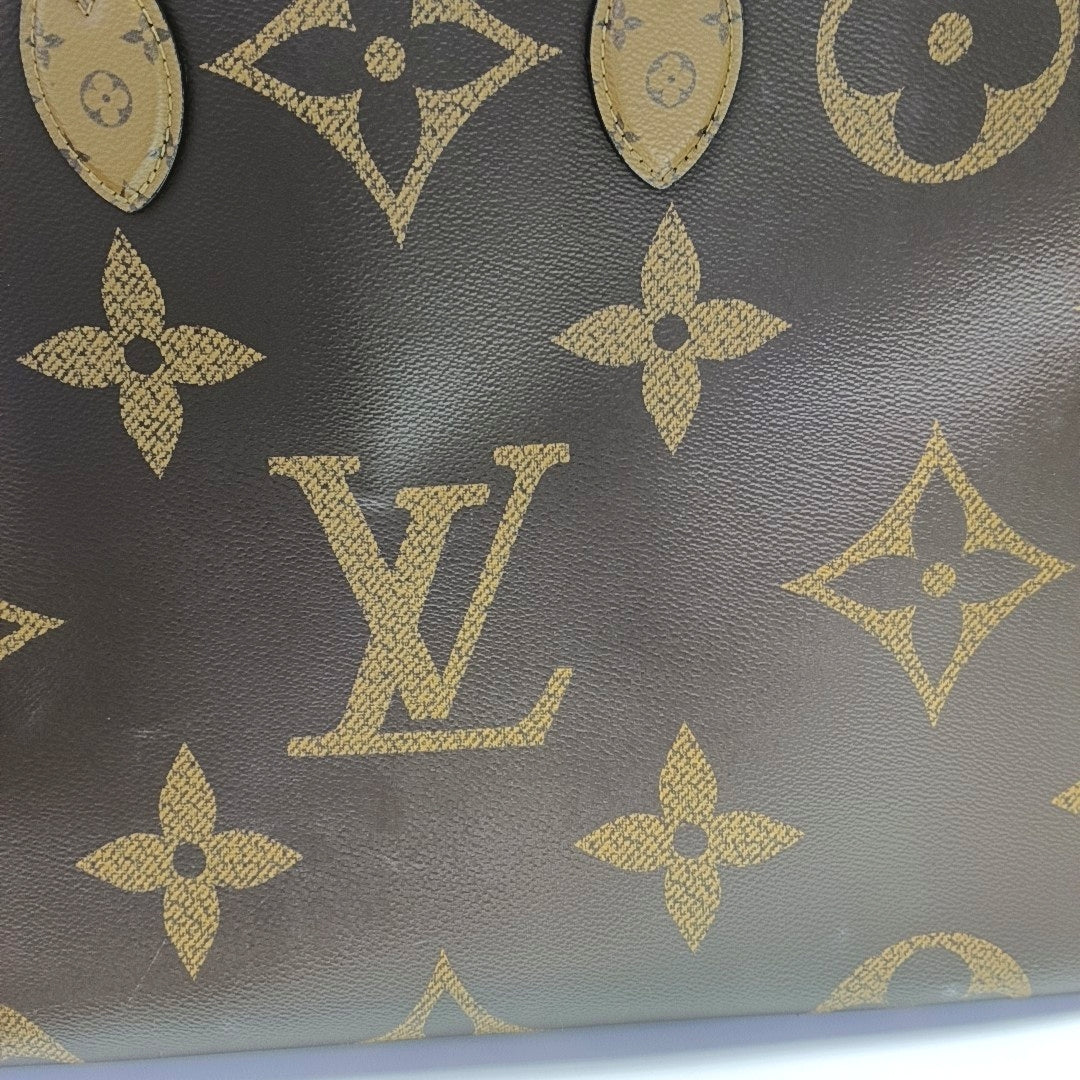 ONTHEGO GM Monogram Coated Canvas Brown