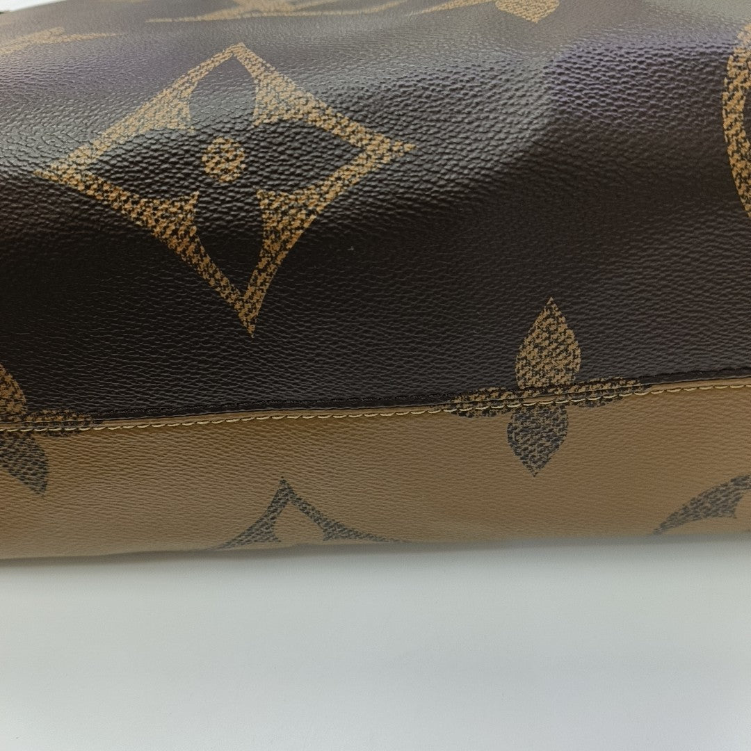 ONTHEGO MM Monogram Coated Canvas Brown