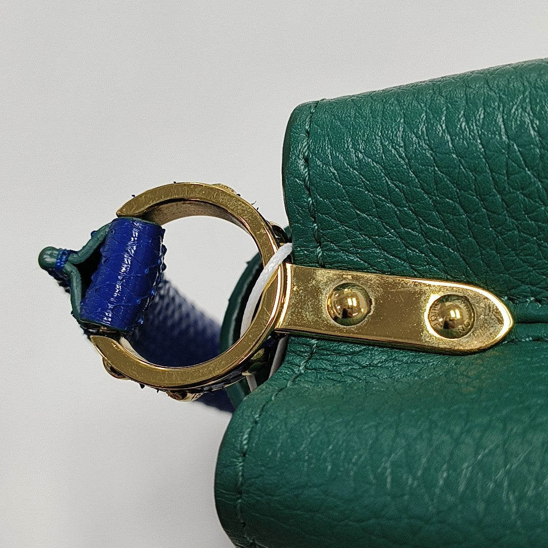Authenticated pre-owned  CAPUCINES Mini Calfskin Green - Shoulder Bag at Looply