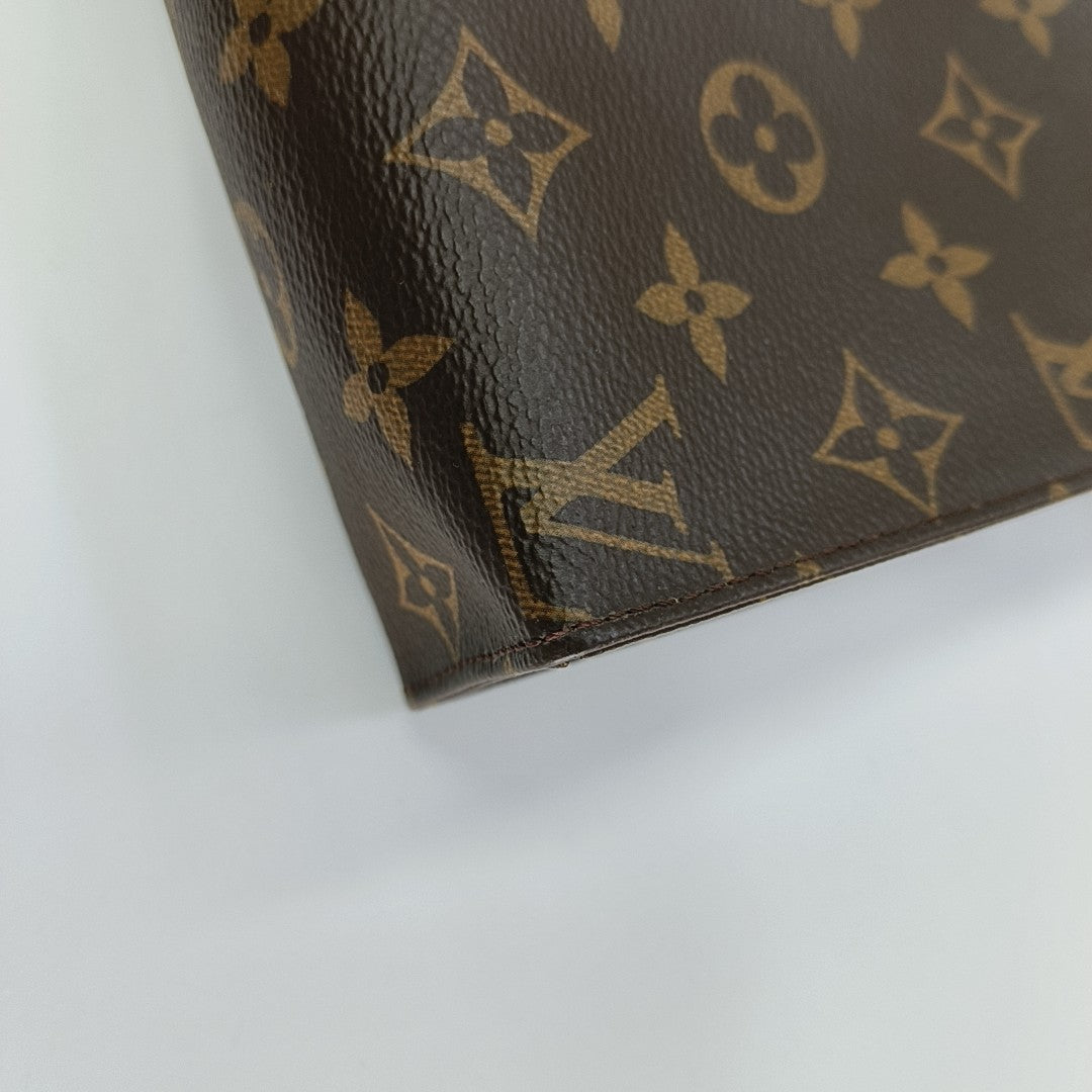 TOILET POCKET 19 Monogram Coated Canvas Brown