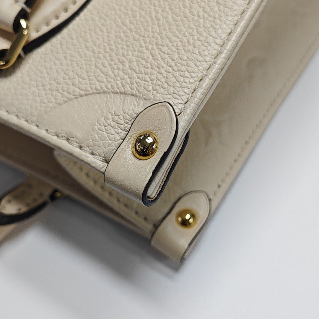 ONTHEGO PM Monogram Calfskin Beige