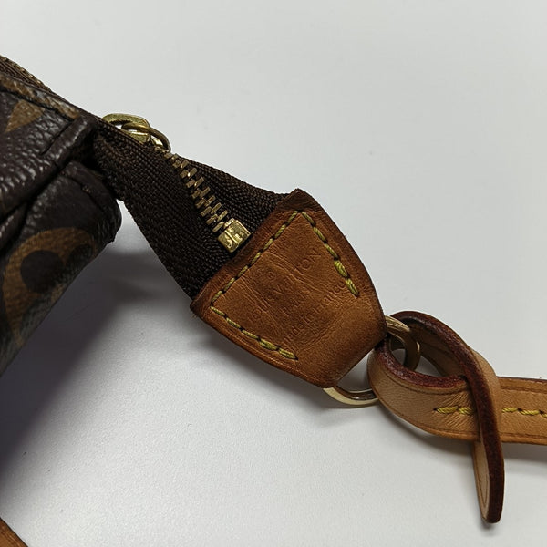 ACCESSOIRES GM Monogram Coated Canvas Brown