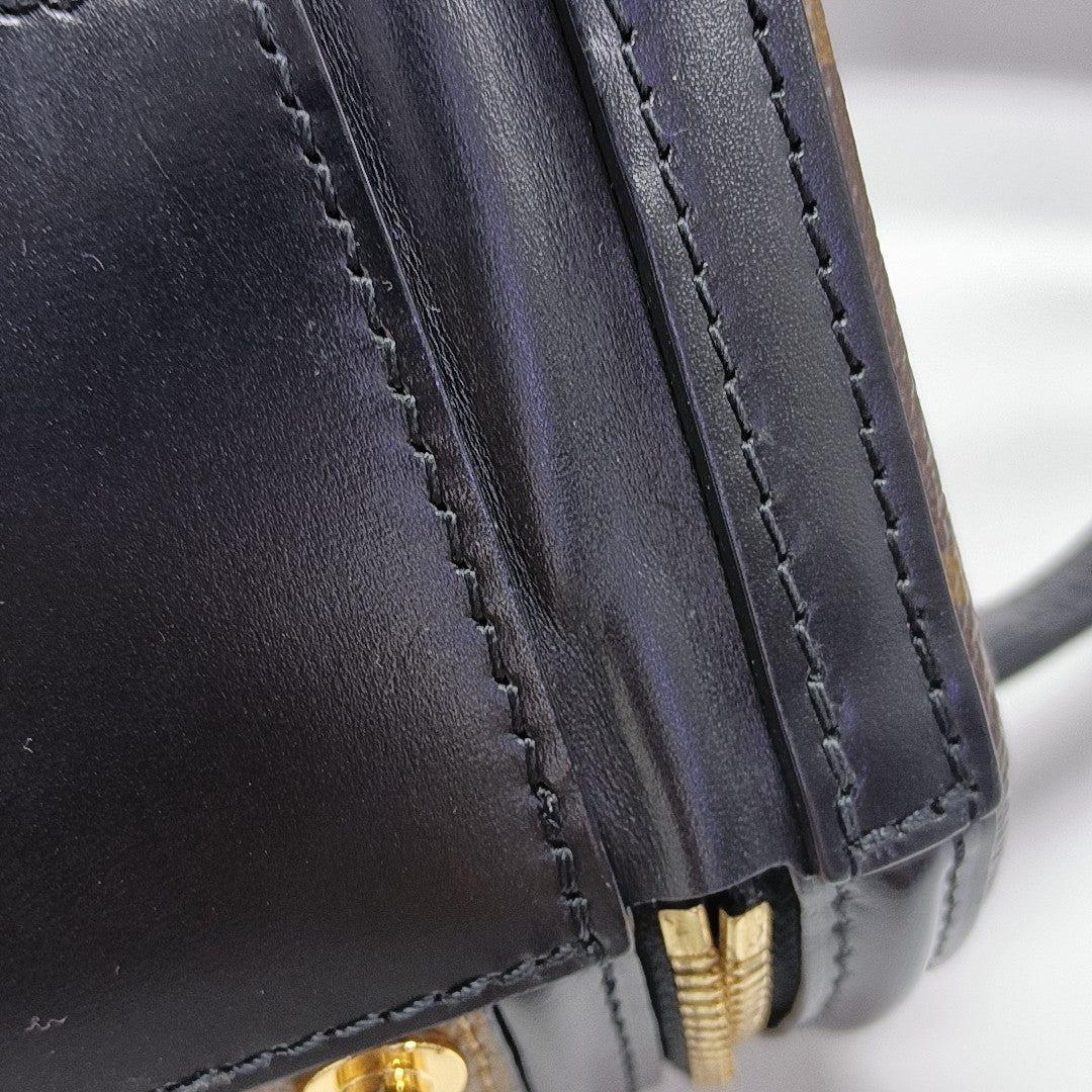 CANNES PM Monogram Coated Canvas Brown