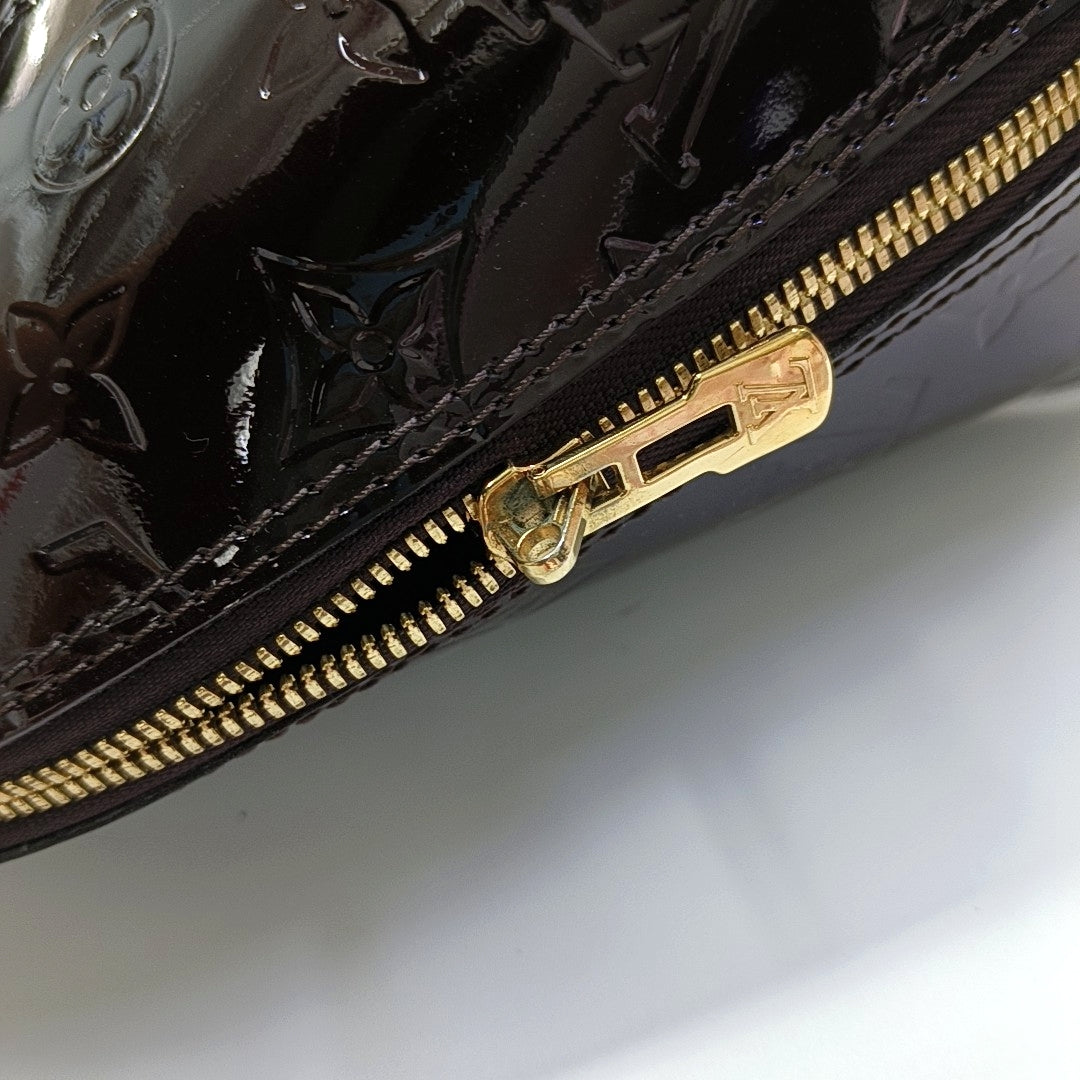Authenticated pre-owned  ALMA PM Monogram Patent Leather Burgundy - Top Handle Bag at Looply