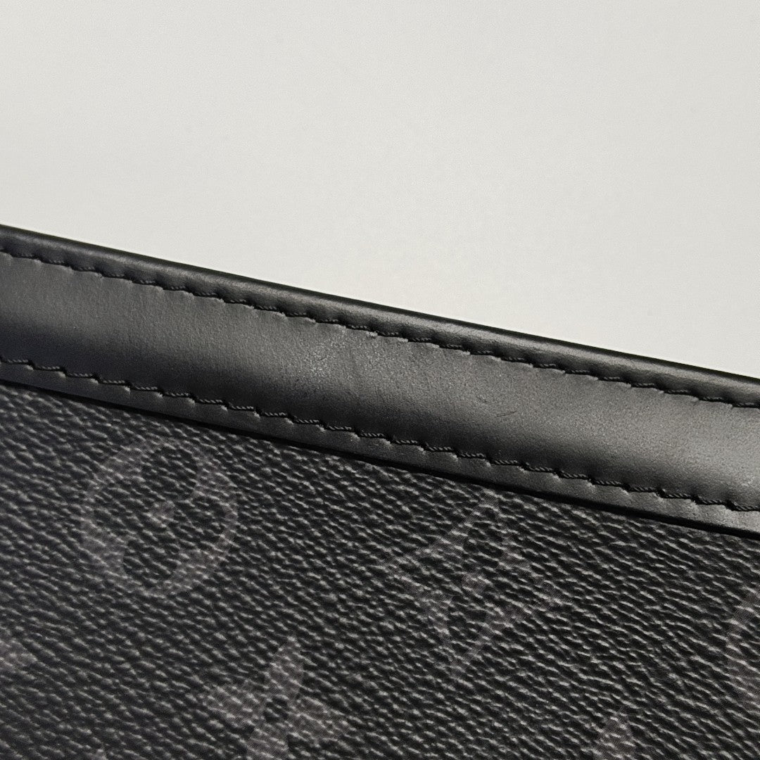 Pochette Voyag MM Monogram Coated Canvas Black