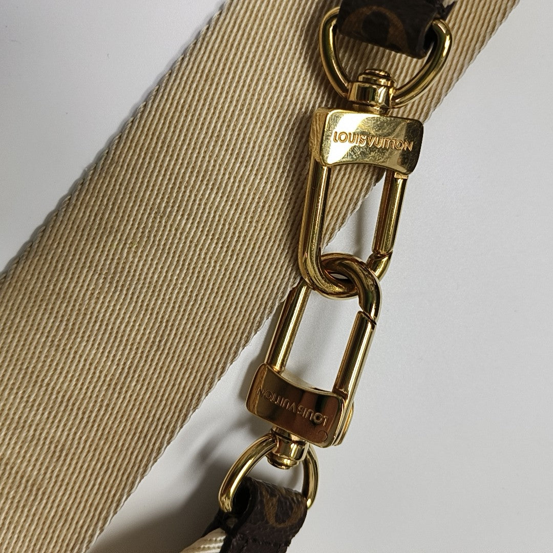 ONTHEGO PM Monogram Coated Canvas Brown