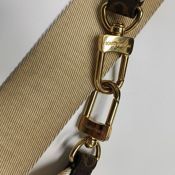 ONTHEGO PM Monogram Coated Canvas Brown