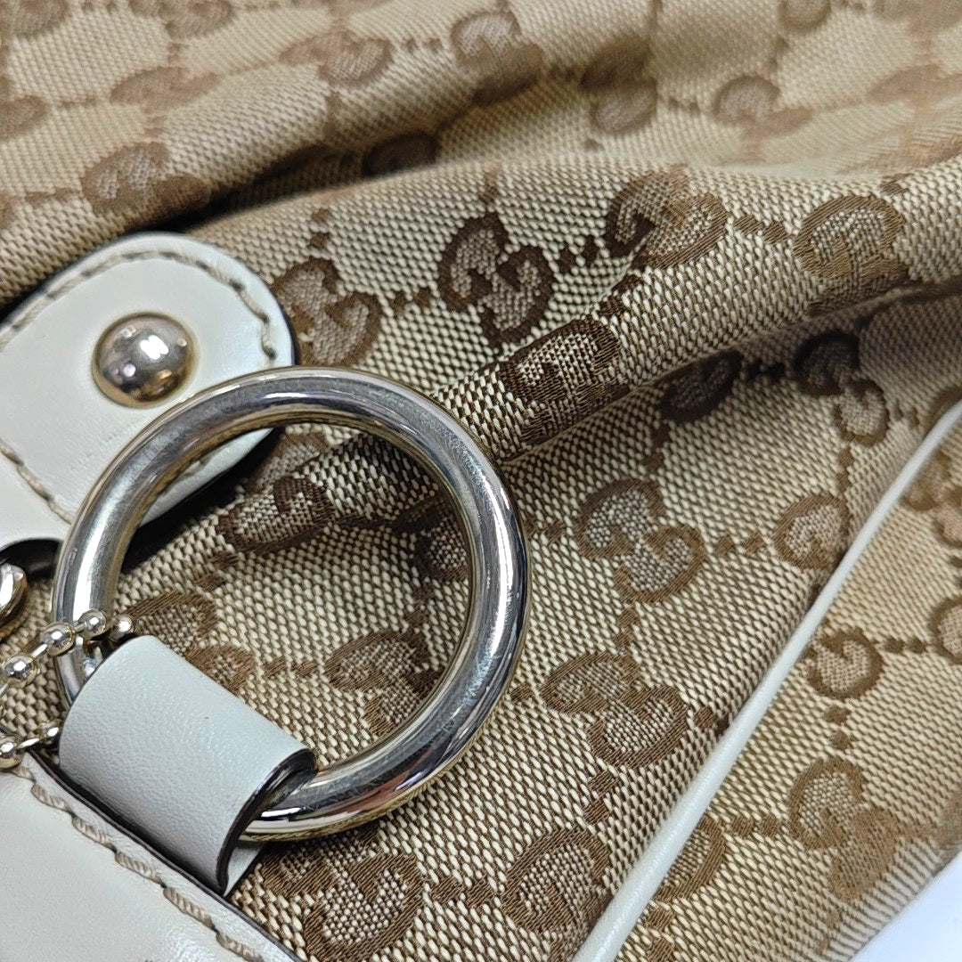 Sukey Monogram Canvas Brown