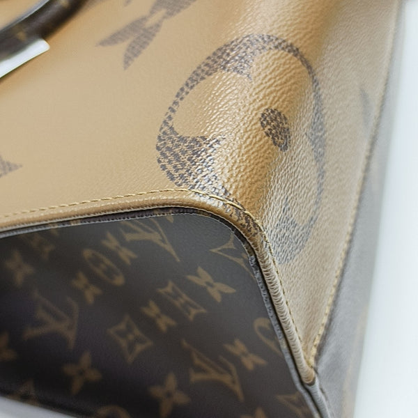 ONTHEGO MM Monogram Coated Canvas Brown