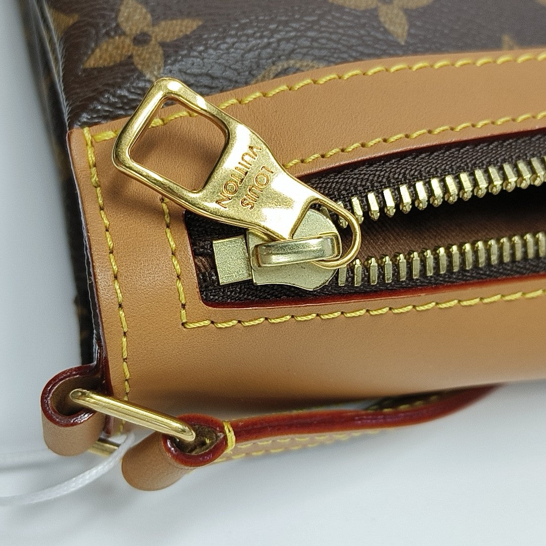 SAUMUR PM Monogram Coated Canvas Brown