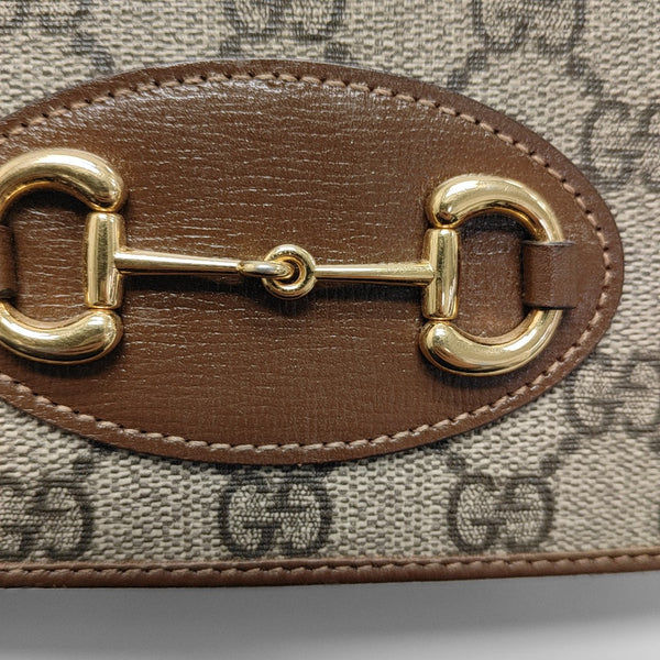 Authenticated pre-owned  Horsebit 1955 WOC Monogram Coated Canvas Beige - Shoulder Bag at Looply
