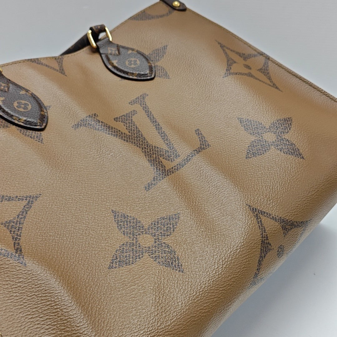 ONTHEGO MM Monogram Coated Canvas Brown