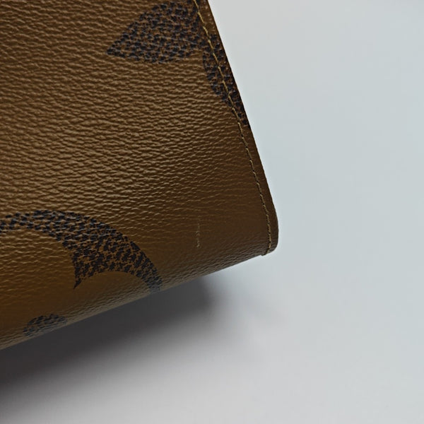 ONTHEGO GM Monogram Coated Canvas Brown