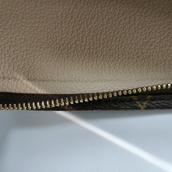 TOILET POCKET 26 Monogram Coated Canvas Brown