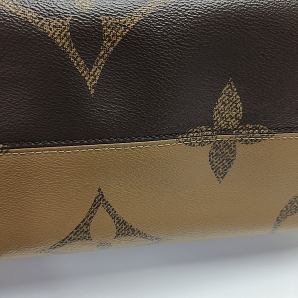 ONTHEGO MM Monogram Coated Canvas Brown