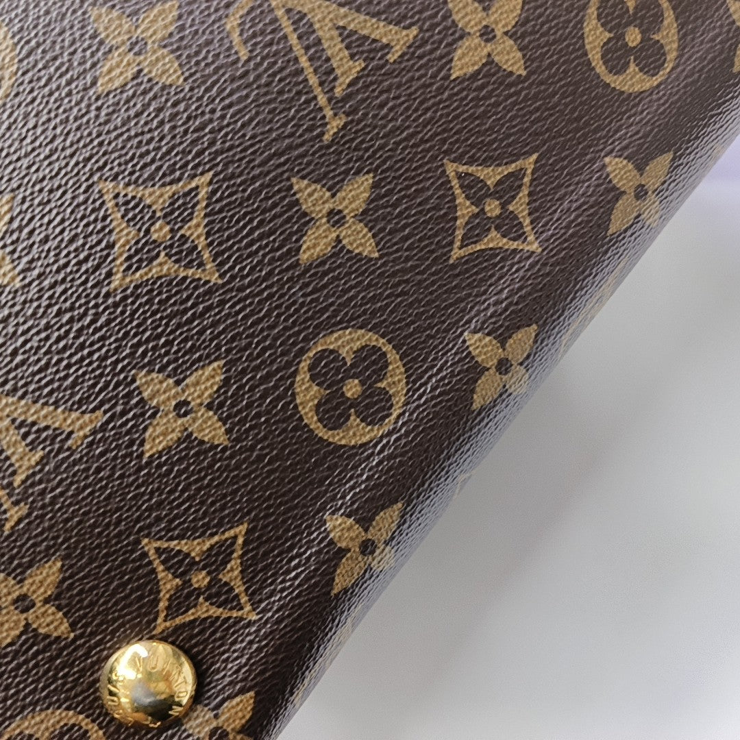 CARRYALL PM Monogram Coated Canvas Brown