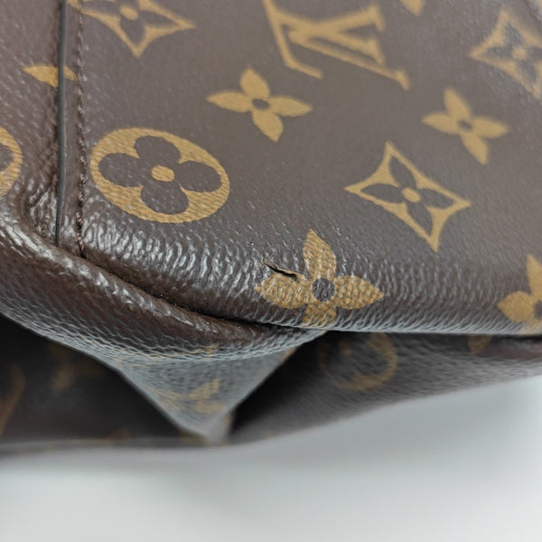 RIVOLI MM Monogram Coated Canvas Brown