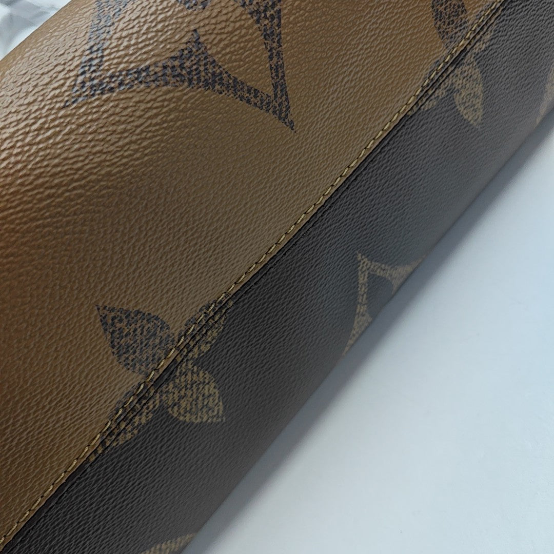 ONTHEGO MM Monogram Coated Canvas Brown