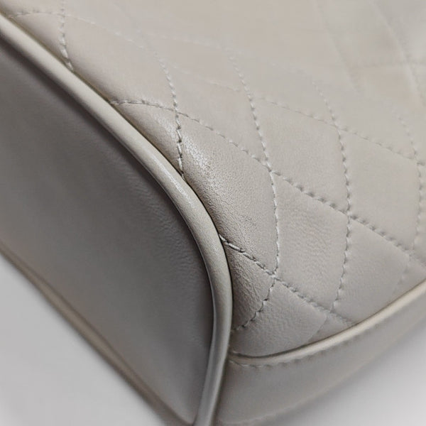 Authenticated pre-owned  CASSANDRE Quilted Lambskin White - Bucket Bag at Looply