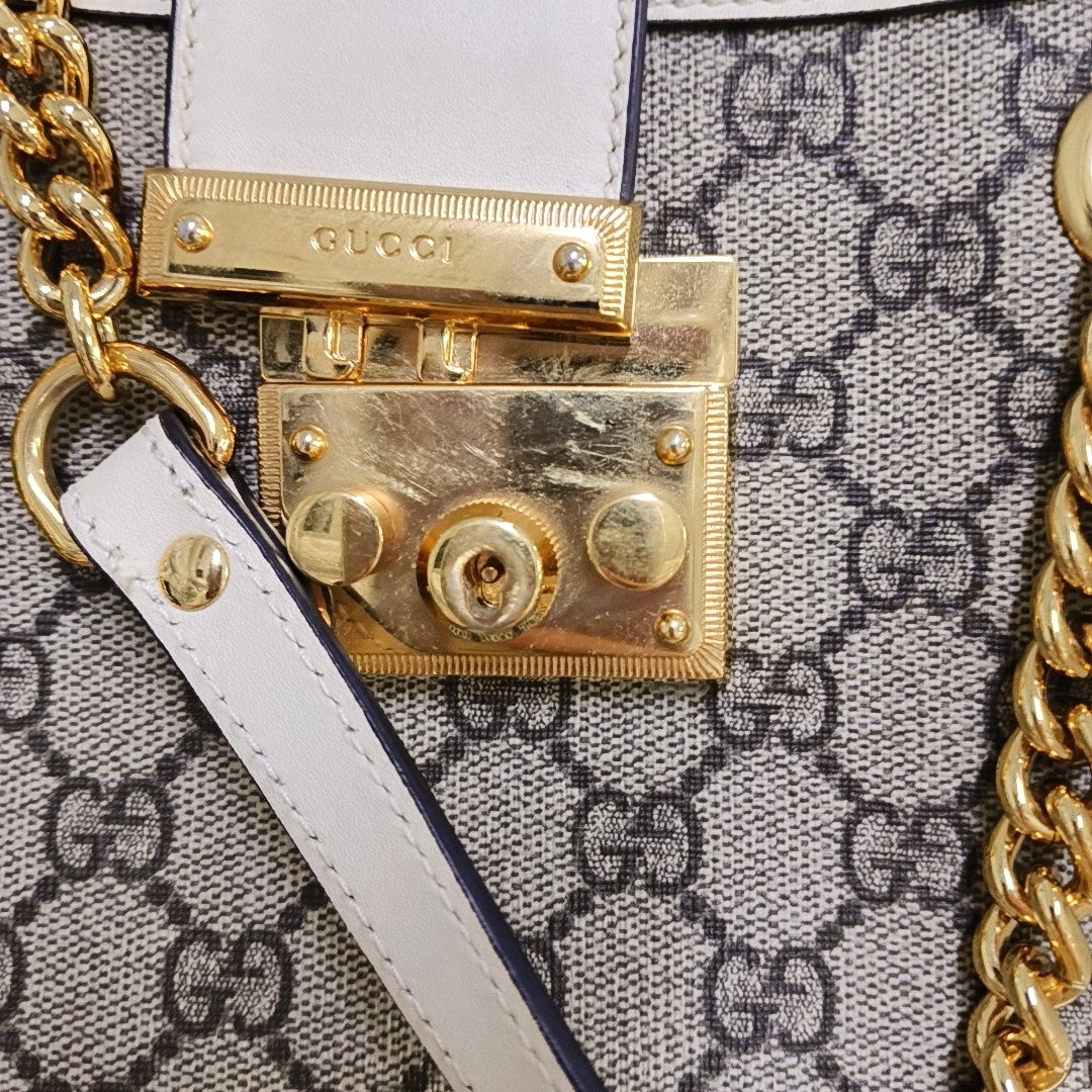 Padlock Small Monogram Coated Canvas Beige
