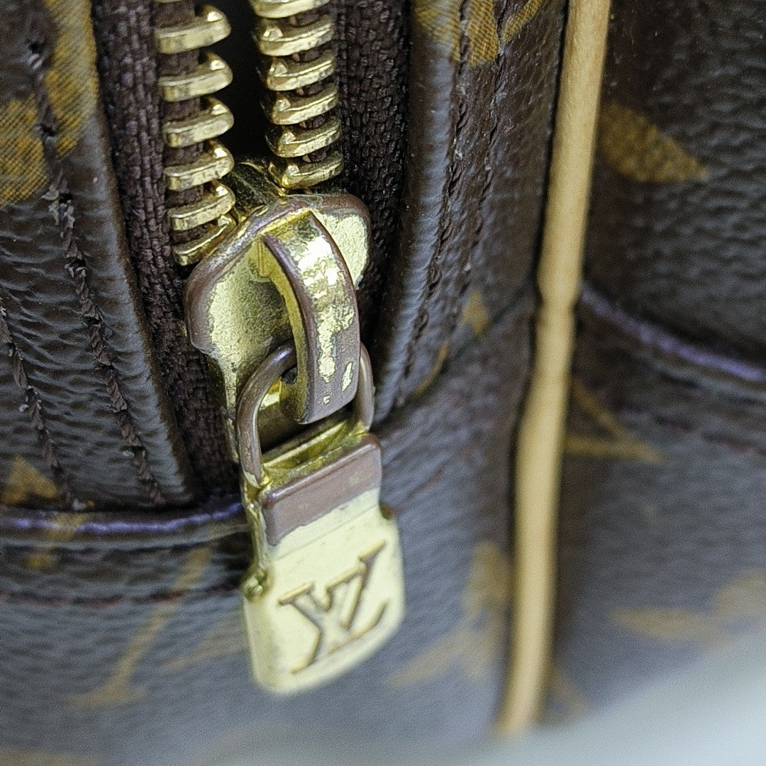 REPORTER PM Monogram Coated Canvas Brown