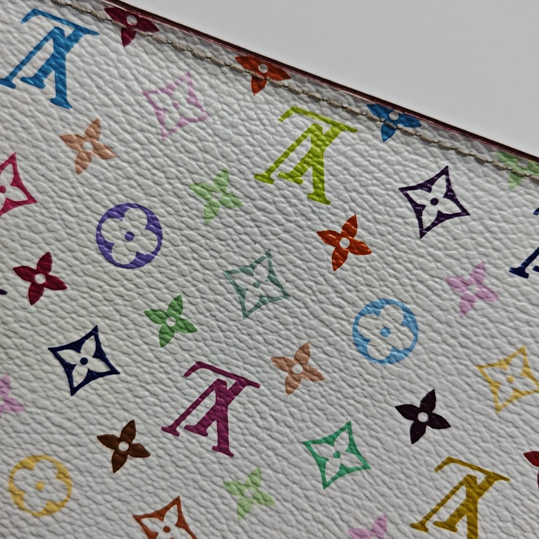 LV × TM INSOLITE Monogram Coated Canvas White