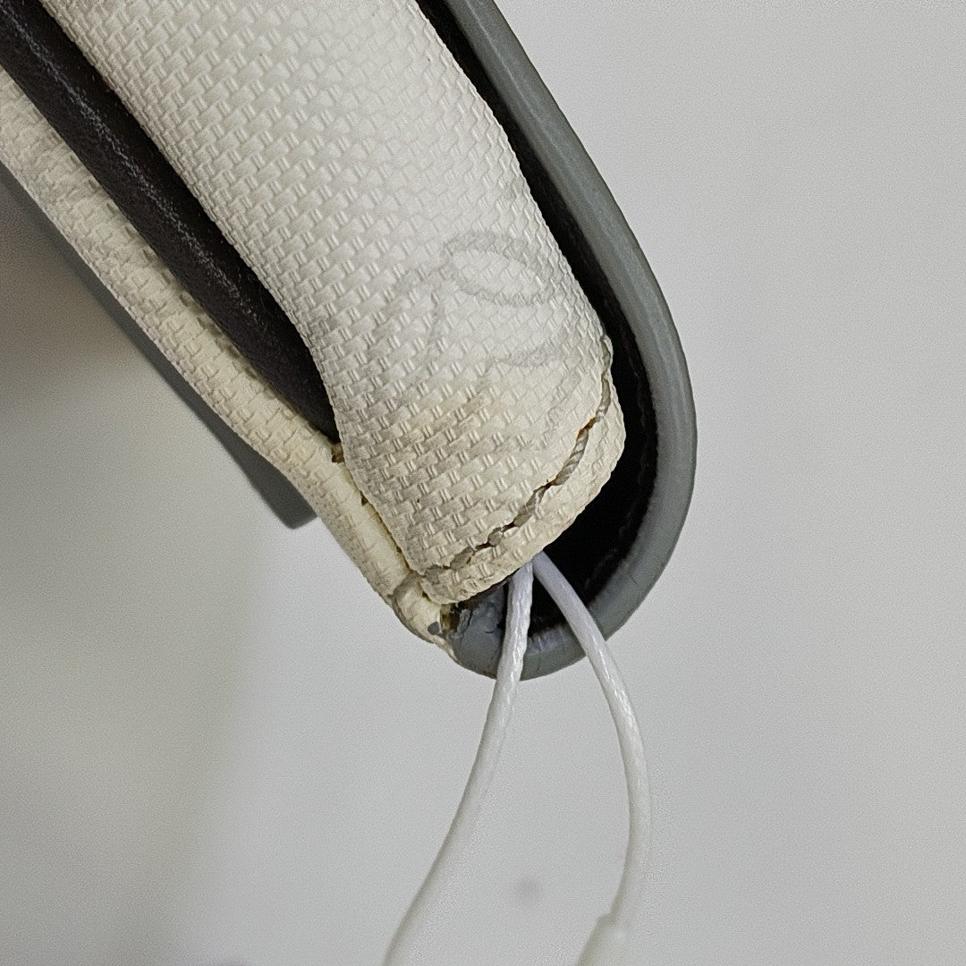 Monogram Coated Canvas Clutch White