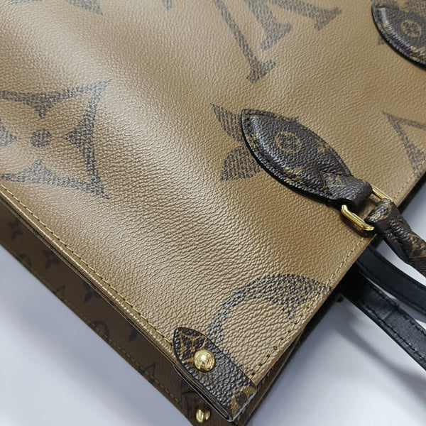 ONTHEGO MM Monogram Coated Canvas Brown