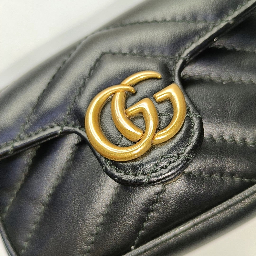 Authenticated pre-owned  GG Marmont Super Mini Quilted Calfskin Black - Clutch at Looply
