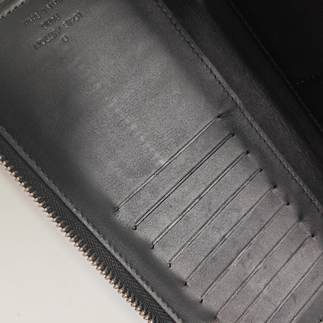 ZIPPY Damier Coated Canvas Blue Wallet