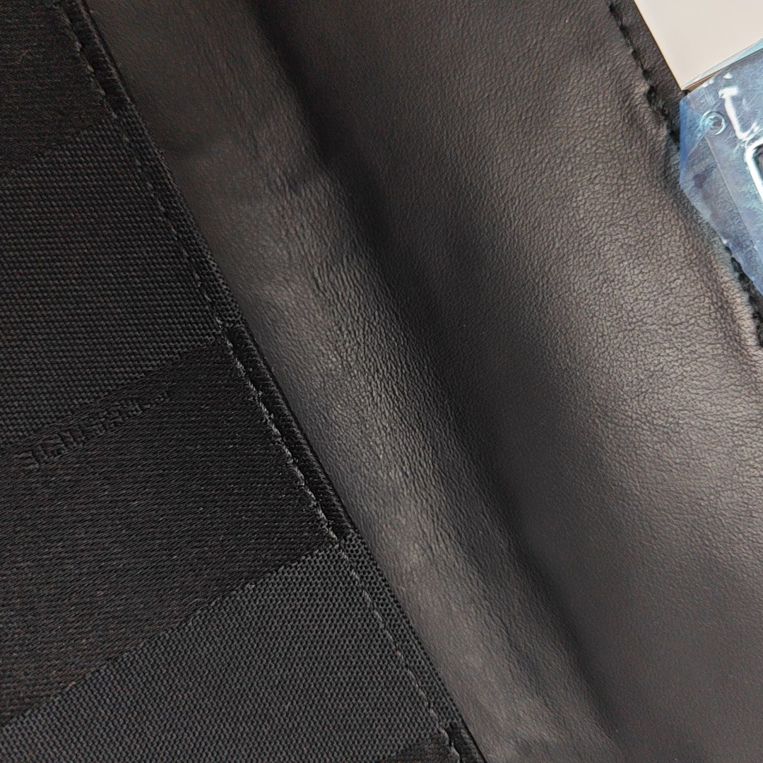 Authenticated pre-owned  Baguette Fabric Black - Shoulder Bag at Looply