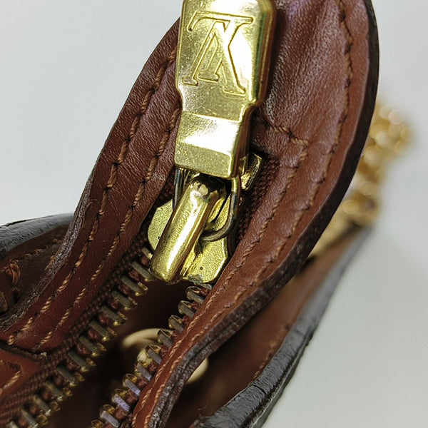 Monogram Coated Canvas Clutch Brown