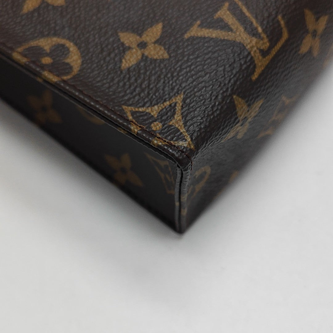 TOILET POCKET 26 Monogram Coated Canvas Brown