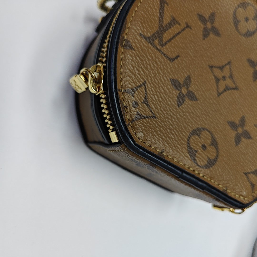 BOITE CHAPEAU Mini Monogram Coated Canvas Brown