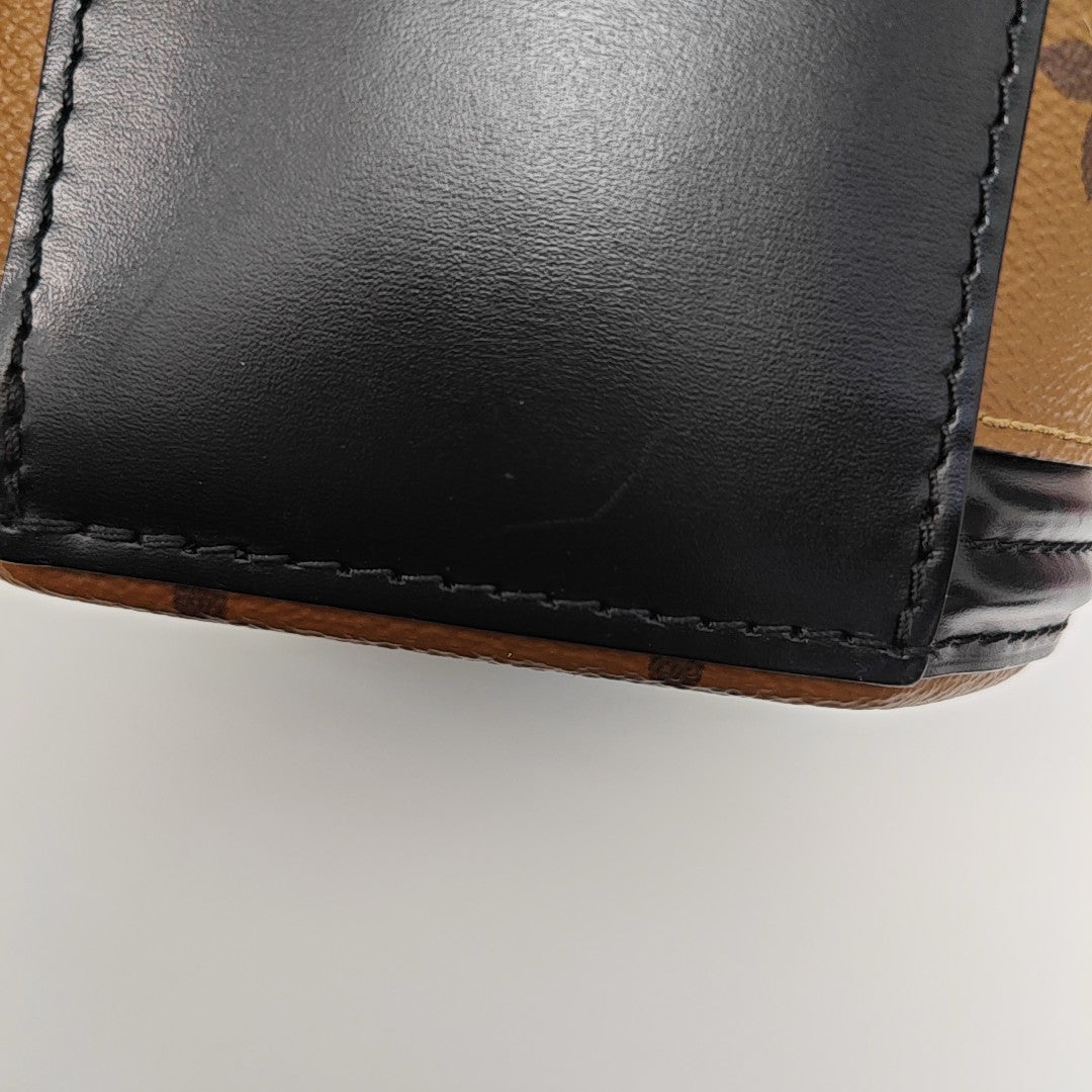 CANNES PM Monogram Coated Canvas Brown