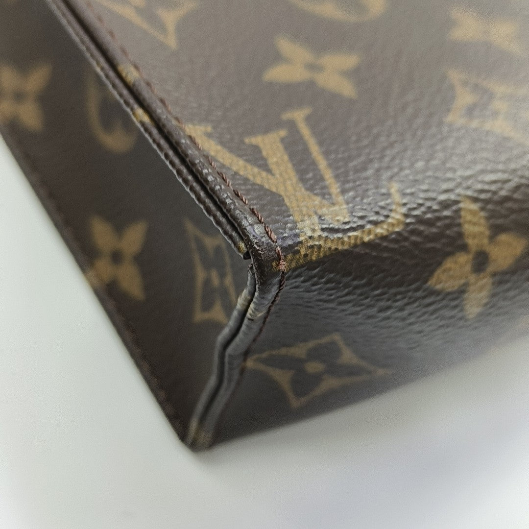 TOILET POCKET 19 Monogram Coated Canvas Brown