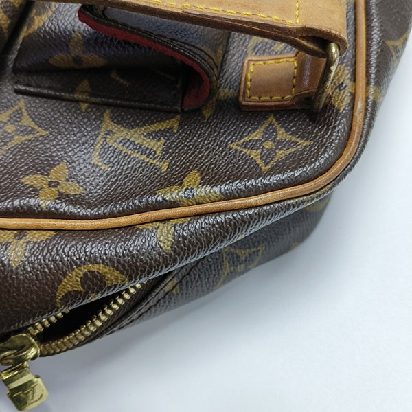 EXCENTRI-CITE Monogram Coated Canvas Brown