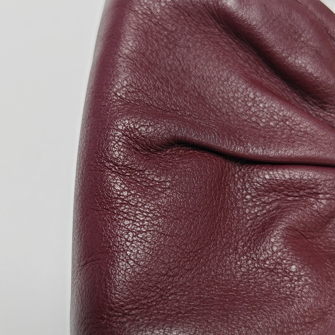 Authenticated pre-owned  The Pouch Calfskin Red - Shoulder Bag at Looply