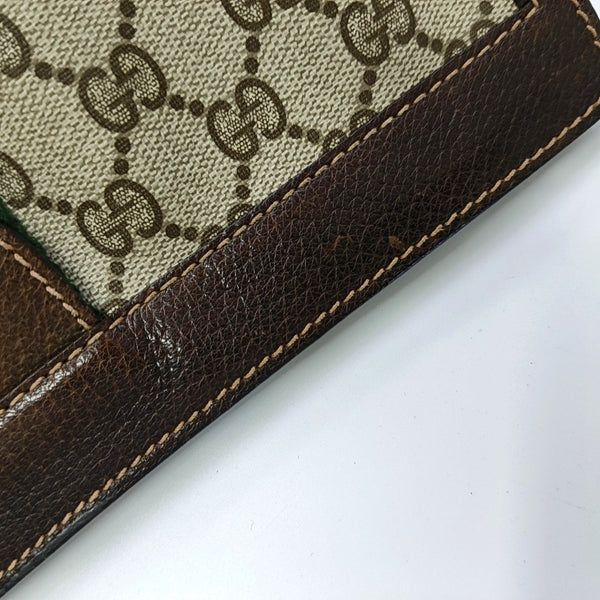 Authenticated pre-owned  Ophidia Monogram Coated Canvas Beige - Clutch at Looply