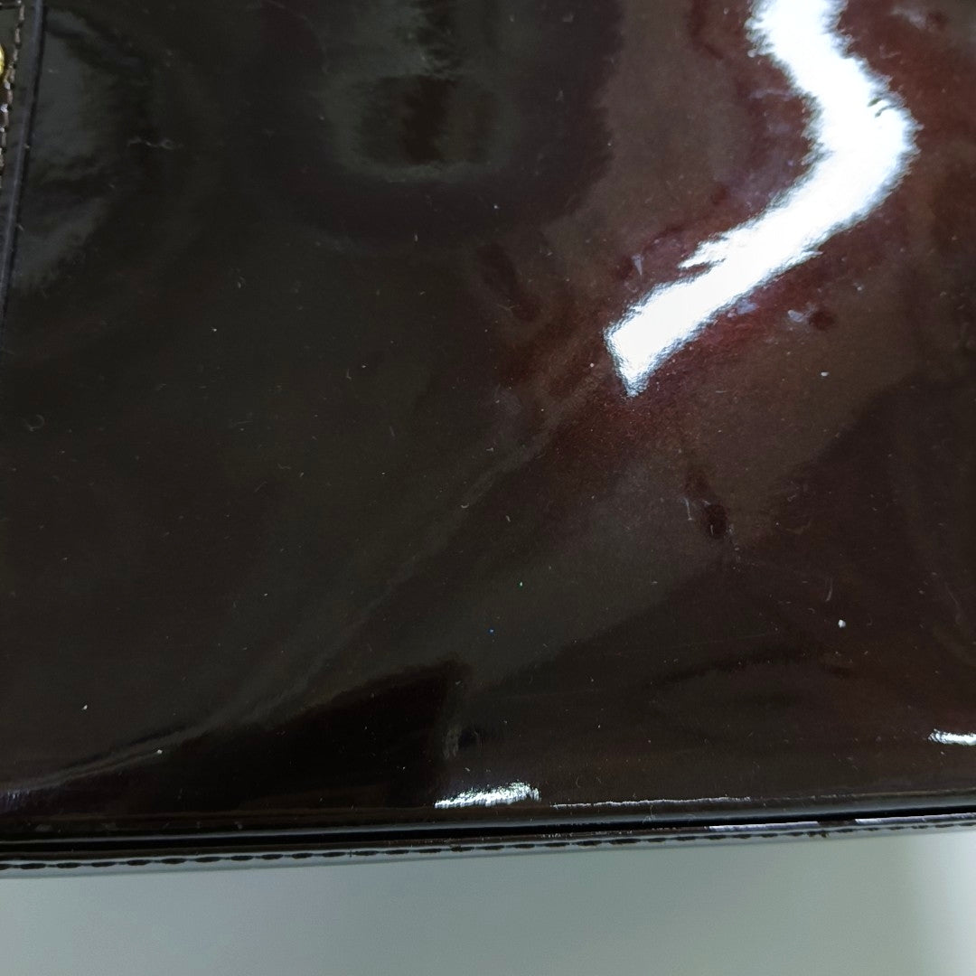 Authenticated pre-owned  ALMA PM Monogram Patent Leather Burgundy - Top Handle Bag at Looply