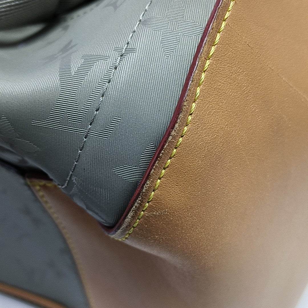 Monogram Coated Canvas PM Gray