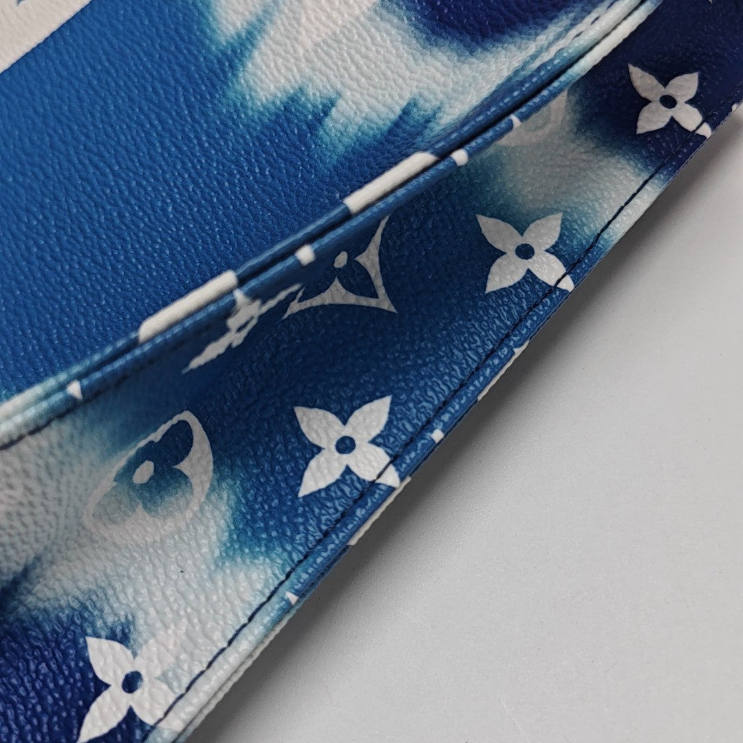 TOILET POCKET 26 Monogram Coated Canvas Blue
