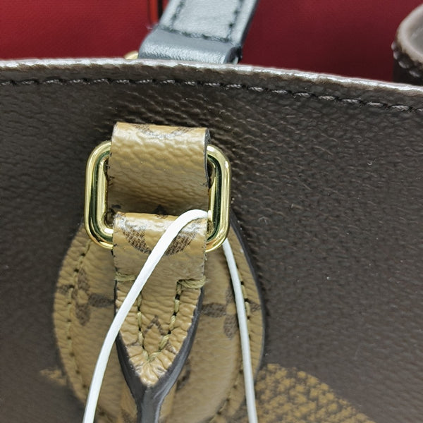 Authenticated pre-owned  ONTHEGO MM Monogram Coated Canvas Brown - Tote Bag at Looply