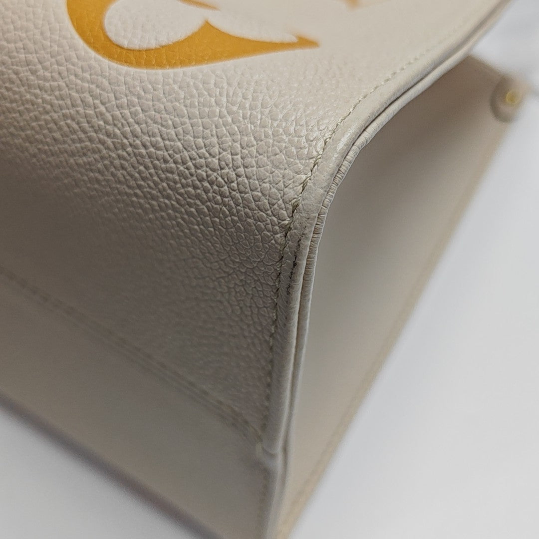 ONTHEGO MM Monogram Calfskin Beige