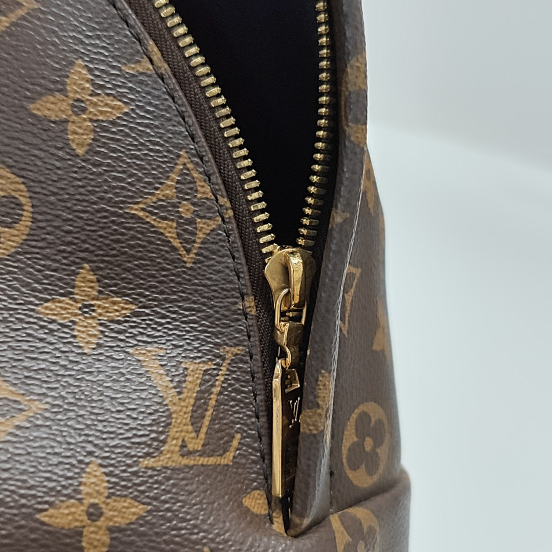 Monogram Coated Canvas Backpack Brown
