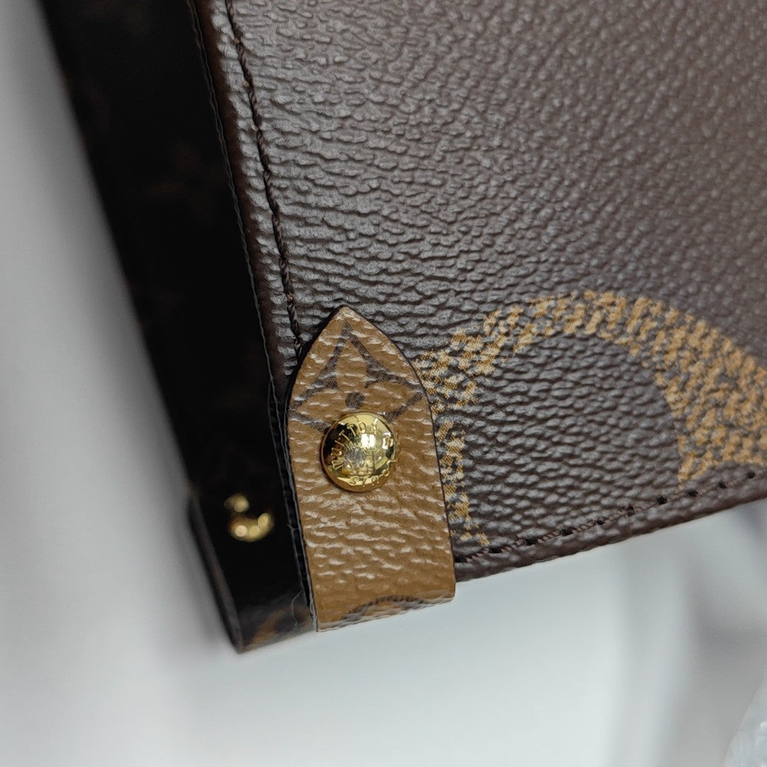 ONTHEGO MM Monogram Coated Canvas Brown