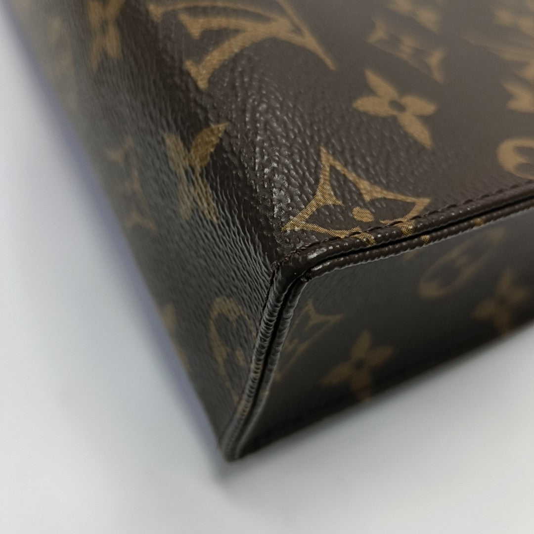 TOILET POCKET 26 Monogram Coated Canvas Brown