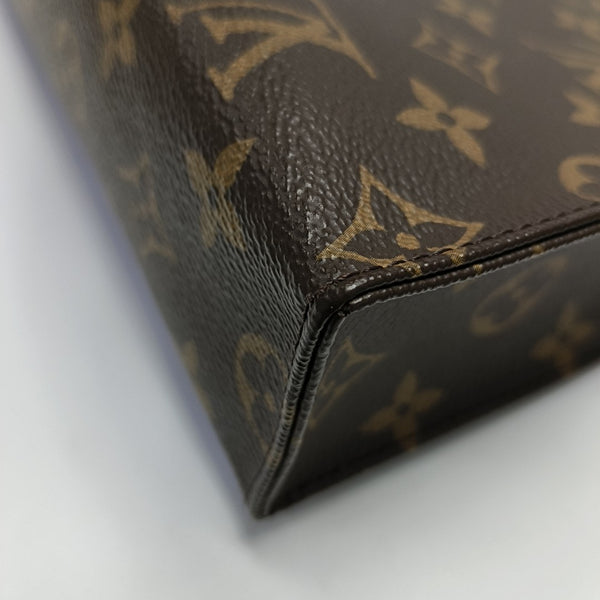 TOILET POCKET 26 Monogram Coated Canvas Brown